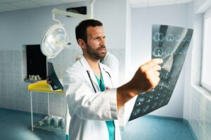 radiologist-doctor-examining-x-ray-images-of-patient-for-diagnosis.jpg