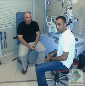 Detailed eye examination and iris analysis using slit lamp before laser eye color change to confirm patient eligibility